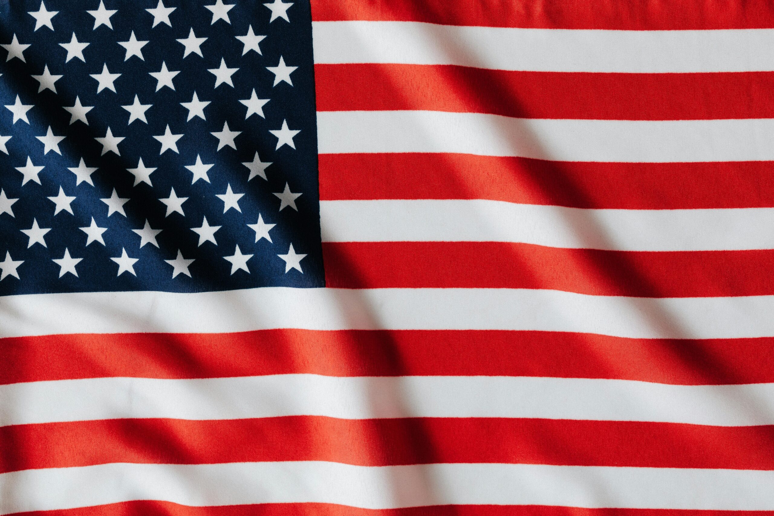 Detailed close-up of the American flag showcasing vibrant colors and texture.